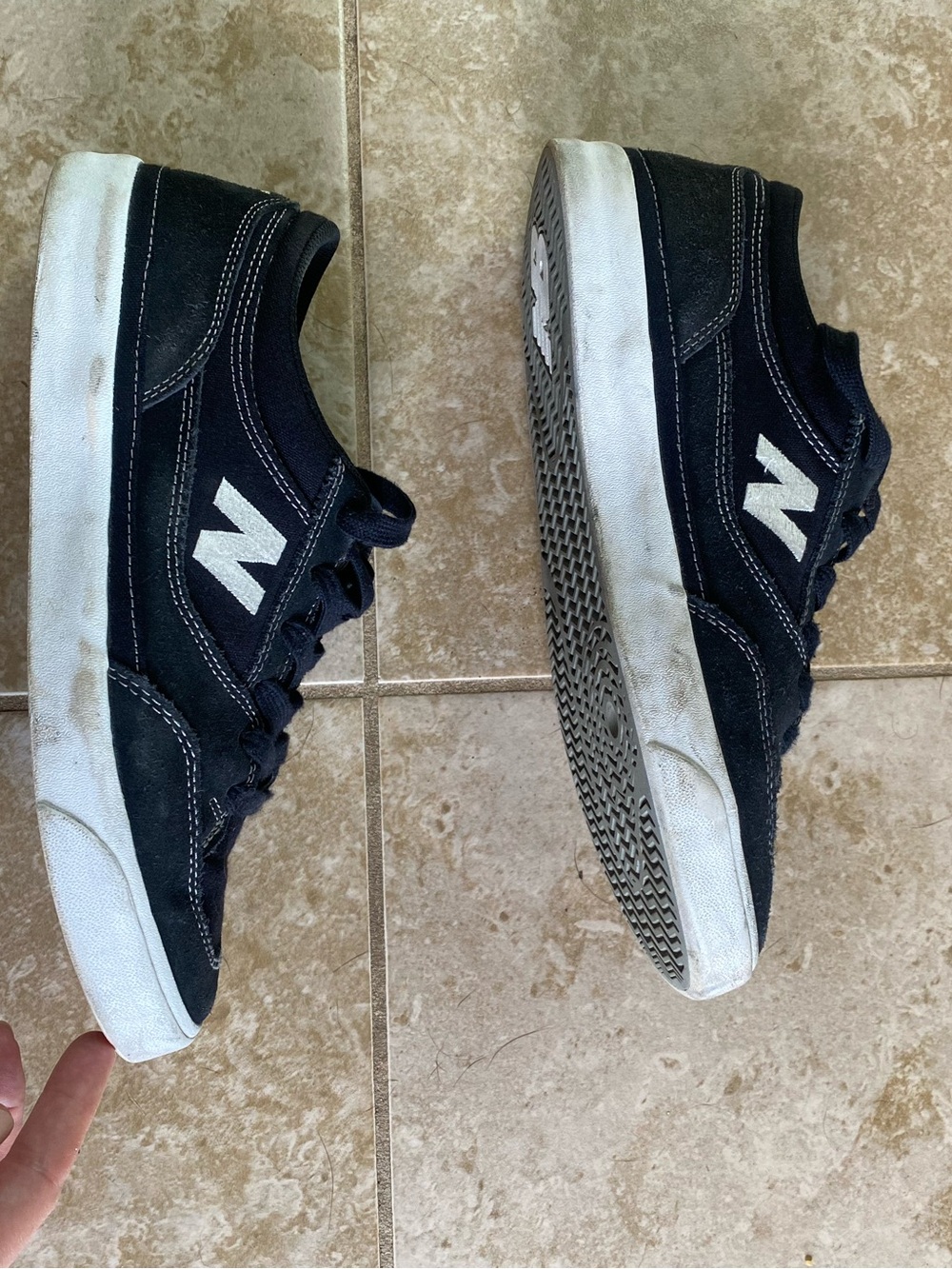 New Balance Men’s Black and White Low-Top Sneakers
